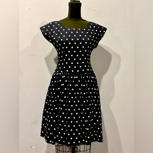 Lili’s Closet from Anthropologie; playful navy polka dot, fit and flare dress.